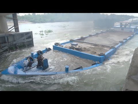 Overloaded Sand Ship Fails While Fighting Upstream At The Dam Gate