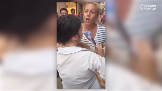 Moment tourist busts pickpocket, grabs her hair