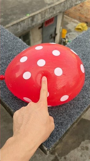 Experiment: Will a water balloon explode if it rolls down a tall building? 💥🎈 #balloon