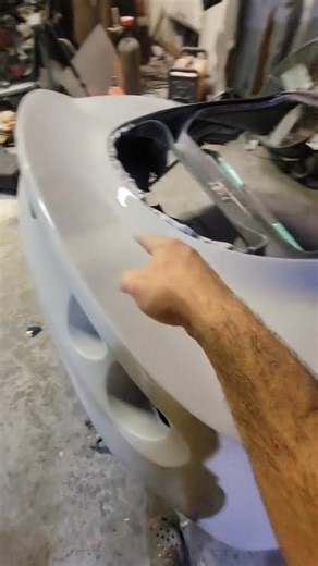 Spraying the filler primer on the Lotus #howto #DIY #autobody #bodywork #lotus #spraypaint | Christina Terry