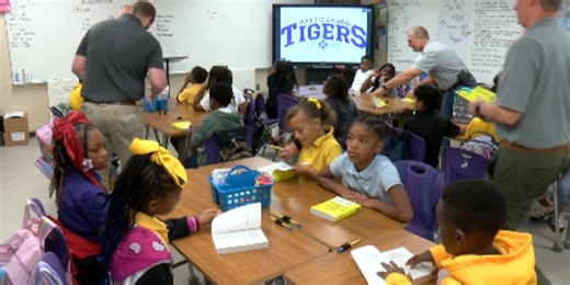 Rotary Club of Hattiesburg-Sunrise handing out free dictionaries to Hub City-area 3rd graders
