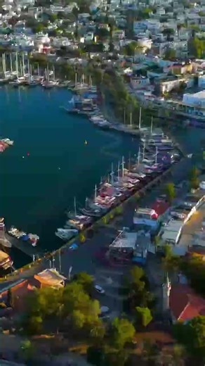 Vertical video. Bodrum, Turkey. Professional aerial footage of Bodrum Castle perfect for travel a...