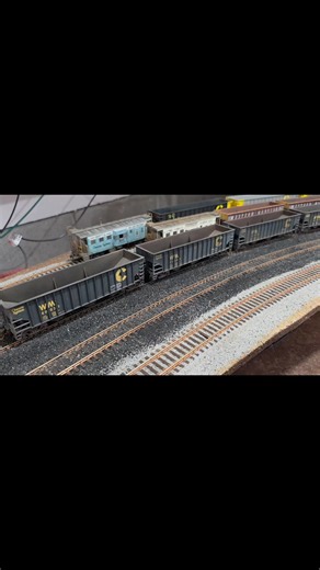 The grade has evened out, so the throttle is side open, and we've picked up a little speed. A caboose coughs as we leave it in our dust, on the Bergoo & Western: Laurel Bank Subdivision From our layout visit 2 weeks ago | Reading and Lehigh Railroad, N scale