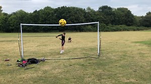 While filming his son and friend playing football, the ball struck the father in a sensitive area. The sudden hit caused him to trip, and he couldn't keep the camera steady. Consequently, he was unable to capture any more footage after the ball hit him. | Jukin Copyright Management | Facebook