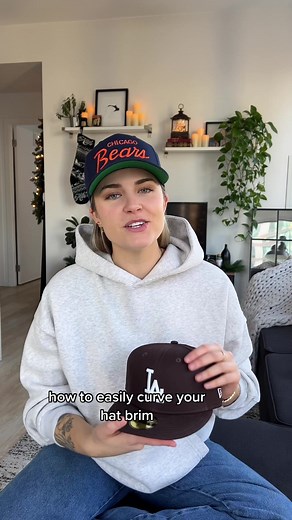 lesbian 101: class is in session! today i’m teaching you how to curve the brim of your hat #fyp #lesbian #androgynousstyle