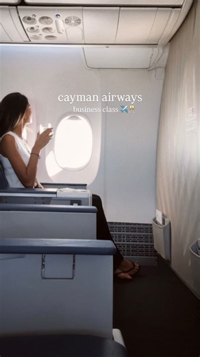 This is Cayman on Instagram: "✈️ Flying Business Class with Cayman Airways is a refined experience from takeoff to landing. Spacious and luxurious seating in an exclusive cabin, champagne in the sky, attentive service, onboard food plus movies and more to keep you entertained above the clouds. #CaymanAirways #BusinessClassExperience #FlyTheCaymanWay #Ad"