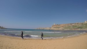 Counting the waves at Ghajn Tuffieha beach! :) | AZURE