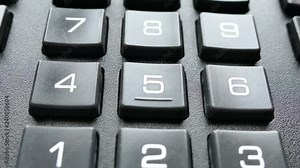 Enter the code with your finger on the buttons with numbers. Digital code and security.