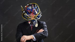 Tech Head - A man's head covered in wires and computer cables