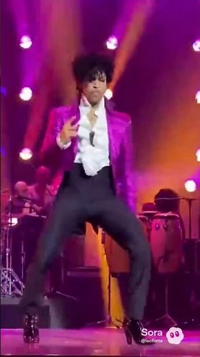 Prince showing off his super funky dance moves on stage