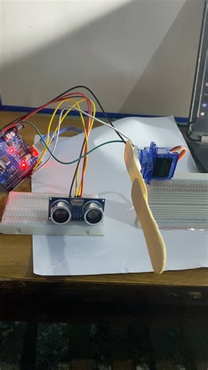 Arslan Robotics Academy on Instagram: "Automatic Door Open System Using Arduino 🤖🚪 In this video, I made an automatic door open system using Arduino UNO, an ultrasonic sensor (HC-SR04), and a servo motor 🛠️. The ultrasonic sensor continuously measures the distance in front of the door 📏. When a person or object comes close to the sensor within about 20 cm, the Arduino processes the signal and sends a command to the servo motor 🤖. The servo motor then rotates and opens the door automatically