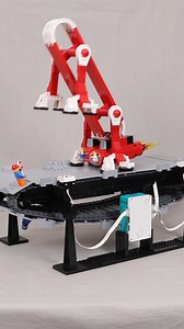 I finally built a treadmill for my LEGO Flip Walker, so that I could display it at public events with constantly running after it. 😁 The speed of the treadmill is controlled by a Minstorms hub, with a couple of sensors to track the walker's position. Full video on YouTube if you want to see how it's built. I've had it running at a single day event already, and it works pretty well. The walker's batteries only last a couple of hours, so it does still need occasional attention. #lego #jkbrickwork