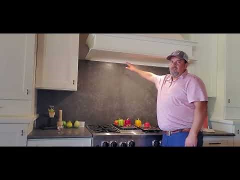 What Height should I install the hood over the cooktop/ range?