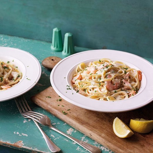 This creamy salmon and prawn linguine recipe is an easy indulgent midweek meal