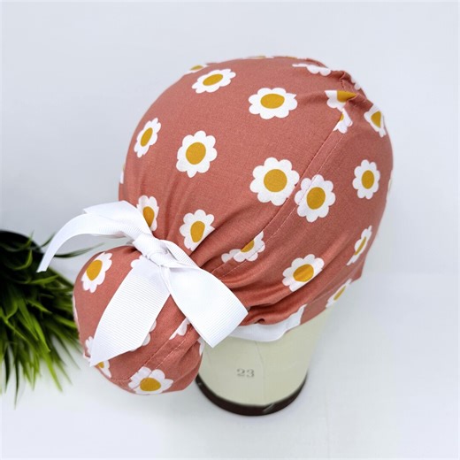 Euro scrub cap with ties for Women. Daisy print European Surgical cap with Satin Lined option by Paradise Caps. Euro PLUS style. Coral.