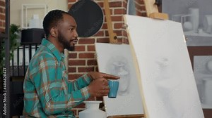 Young teacher explaining drawing skills at art class lesson with creative students, attending sketch practice program. Leisure activity workshop to teach how to draw contemporary object.