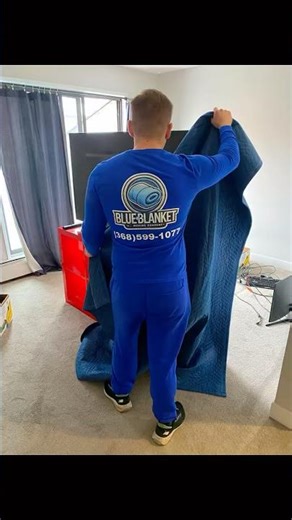 Calgary Movers Wrapping and Moving a Heavy Dresser | Blue Blanket Moving