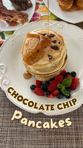 Recipe.TV on Instagram: "Some mornings need a little pizzazz —and a lot of chocolate. ✨🥞 Chef Roberta’s 🍫CHOCOLATE CHIP PANCAKES 🍫bring that cozy, happy energy back into the kitchen, with fluffy stacks and melty bites that make everyone linger at the table just a little longer. They’re easy enough for busy weekdays, sweet enough to feel special, and guaranteed to turn groggy mornings into smiles. Add fruit, pour the syrup, and let breakfast be the best part of the day. 🍓🍫 🎥 Check your loca