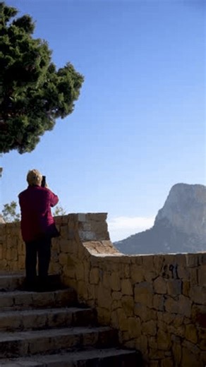 clip-3995002245-retired-woman-recording-video-phone