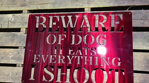 99K views · 1.2K reactions | Beware of the dog, it eats everything I shoot. https://www.redlinesteel.com/collections/miscellaneous/products/beware-of-dog | Redline Decor | Facebook