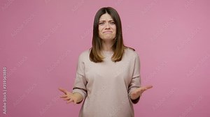 How could you! Depressed brunette woman looking with upset disappointed face and raising hands with indignant expression, asking why, what problem. indoor studio shot isolated on pink background
