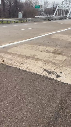 01/25/26 Sunday Morning Road Update – Hwy 19 S | Trinity River Bridge (10:00 AM) Folks, I’m out here at the Highway 19 South bridge over the Trinity River, and as of 10:00 AM the bridge is passable, but don’t let that fool you. There is a lot of moisture on the roadway slush and liquid and with the temperature sitting around 24 degrees, this will turn back into ice quickly as conditions change. Please use extreme caution if you have to travel. I also want to address some of the criticism floatin