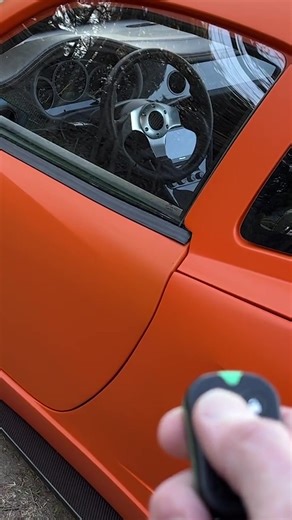 Automatic door opener: yay or nay? This Factory Five Racing 818C is a tube-frame kit car that is powered by a turbocharged 2.0-liter Subaru flat-four paired with a five-speed manual transaxle, and it shifted onto #bringatrailer in June 2023. Learn more about this unique ride at our linkinbio. #cartok #doors #racecar #subaru #turbocharged