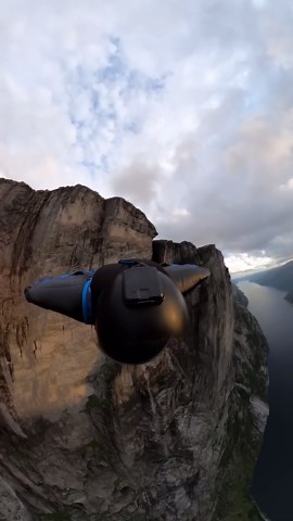 Wingsuit BASE jump launch off human catapult