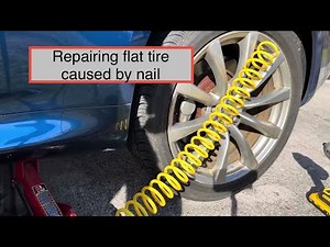 Fixing nail puncture in a tire using Slime deluxe tire plug kit tutorial installation instructions.
