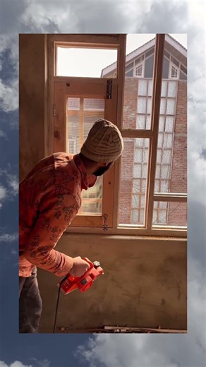 Precision is key. Getting that window just right! 🏡🪵"