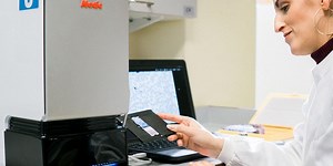 AI-Powered Microscope Counts Malaria Parasites in Blood Samples