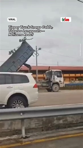 8.3K views · 47 reactions | 12 June 2025: A tipper truck brought down power cables and lampposts, sparking outrage online with many questioning the driver’s awareness: “Are you blind?” Click the link in bio @theSundaily to read the full story #theSun #theSunMY #localnews #trendingnewsmalaysia | The Sun Malaysia | Facebook