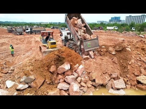 Wow!! It's every special action strong bulldozer working with incredible huge stones moving
