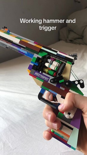 Building a Functional Lego Revolver with Working Cylinder, Hammer, and Sights