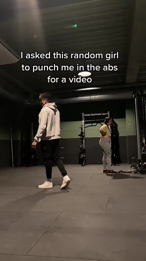Random Girl Punches Guy in the Abs for Video