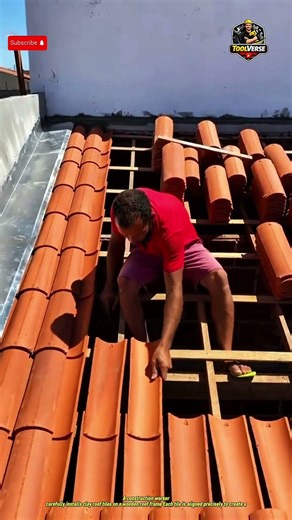 Worker Installing Clay Roof Tiles with Precision and Care #construction