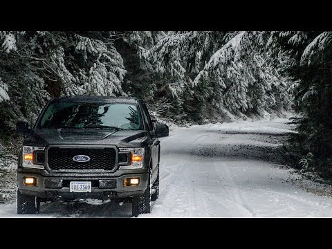 STOCK F150 VS Snow and Ice. On Hankook Dynapro AT2 tires. 4X4 with a Locker.