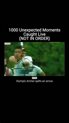 CAUGHT ON LIVE on Instagram: "There’s a clip going around that has archery fans losing it: an archer hits a target, and then perfectly splits someone else’s arrow already embedded in the target. It’s the kind of “Robin Hood” shot legends are made of. The video shows the first arrow lodged in the board, then another archer fires one that goes right through it — clean through centre, from shaft to nock — like the target wasn’t just a surface but a tunnel of precision. People are debating whether i