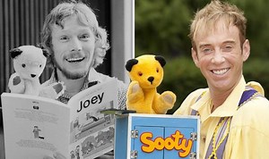 Childhood favourite Sooty plays with an auctioneer's gavel