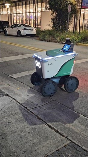 Watch a robot deliver food in Miami