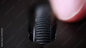 Working with computer mouse extreme close up