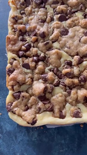 29K views · 6.2K reactions | Chocolate Chip Cookie Dough Cheesecake Bars - buttery graham cracker crust with a cheesecake layer and topped with cookie dough. * https://www.the-girl-who-ate-everything.com/chocolate-chip-cookie-dough-cheesecake/ | The Girl Who Ate Everything | Facebook