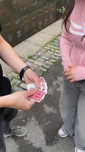 Demonstrating a clever red king card trick