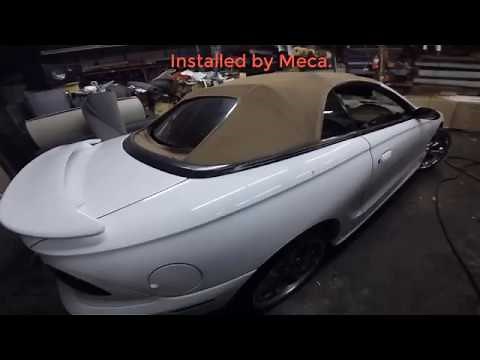 How to Remove and Install a New Rear Window and Convertible Top on a 1998 mustang