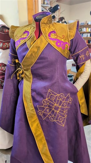 Feral-Workshop/ Atelier Feral on Instagram: "💜🐍 serpent priestess WIP 🐍💜 I am working on this beautiful priestess set for a vampire LARP. I am in love with the silk and linen mix. Still missing the leather engraved belt. #larp #fantasy #larpersofinstagram #feralworkshop #fantasycouture #larper #embroidery #fantasyevents #fantasydress"
