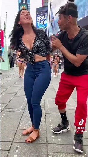 Woman doing the handcuff ￼ escape challenge