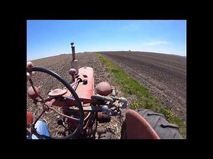 Farmall H pulling a disc