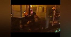 Watch: Two Philadelphia Firefighters Rescued from Row House Fire