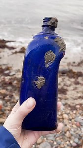 6.4K views · 944 reactions | Here is a blue glass bottle that I found on the Jurassic Coast, Dorset  #fossils #fossil #bluebottle #glass #glassbottle #blueglass #ammonite #ammonites #pyrite #ancient #curiosity #nature #photography #jurassic #coast #jurassiccoast #beach #stones #rocks #sea #sand #maryanning #dinosaur #palaeontology #geology #dorset #charmouth #charmouthbeach #lymeregis #fascinatingfossils | Fascinating Fossils | Facebook