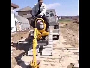 Mini-Excavator  (VIDEO)